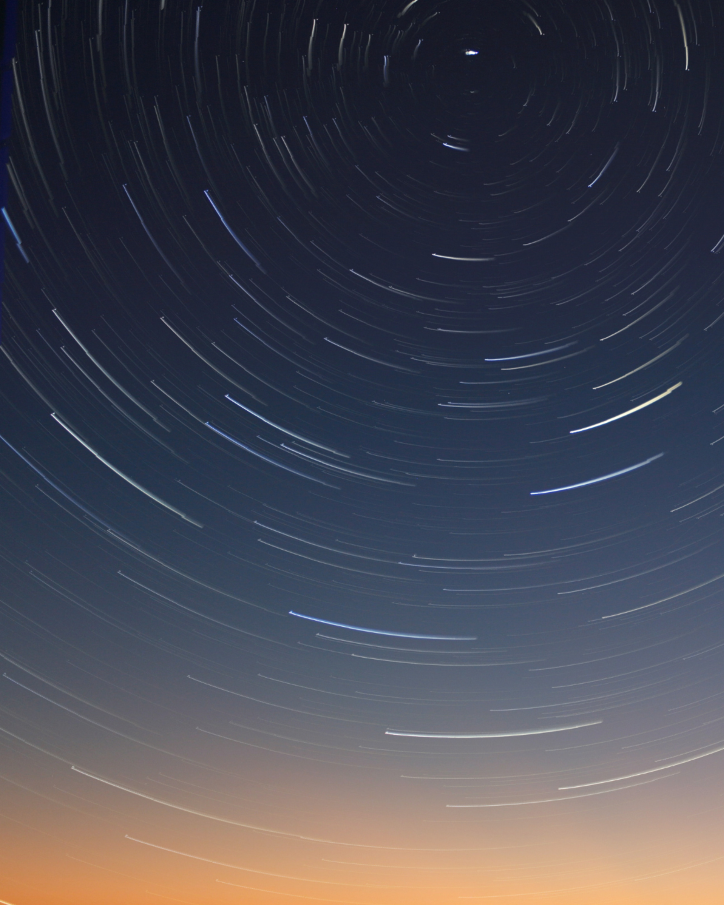 Modern digital background with blue-orange color transition and circular dashed lines.